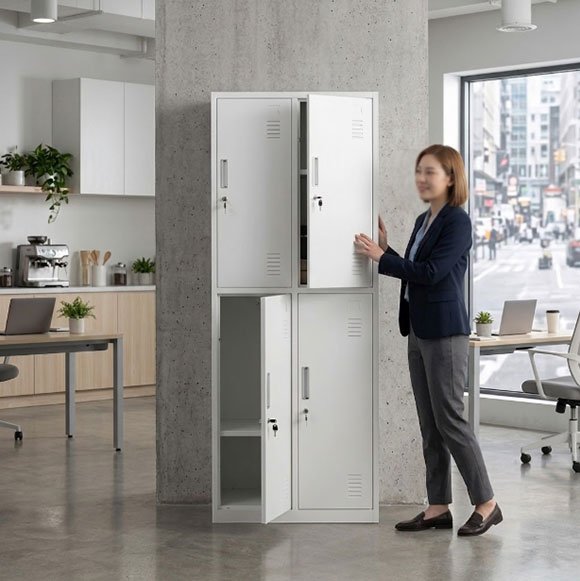 Young woman opening lower door of 4 door steel locker in dormitory setting